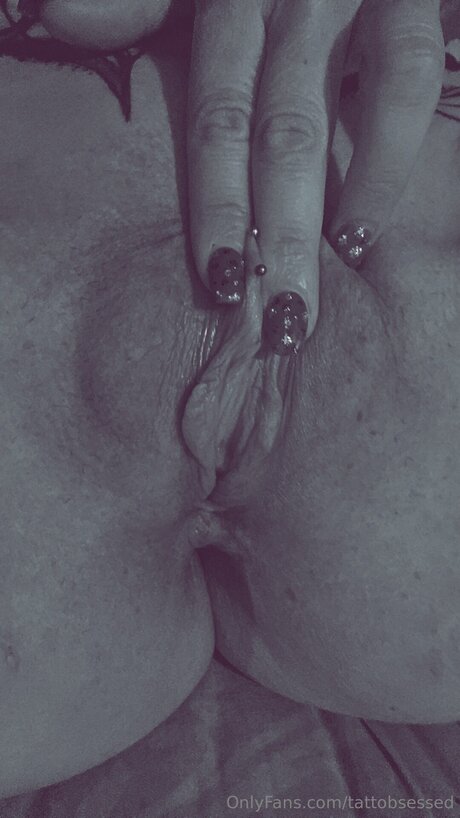 Tattobsessed xxx pornstar pic