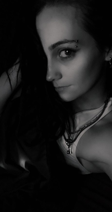 Tattooed Mystique pretty model photos