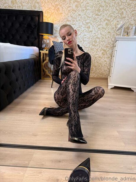 Blonde Admin model hot pics