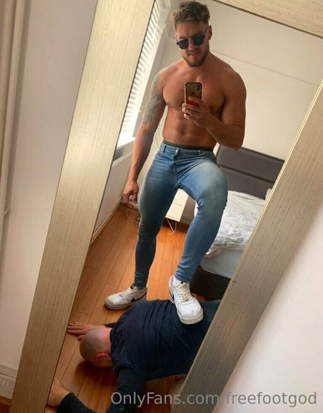 freefootgod naked model photo